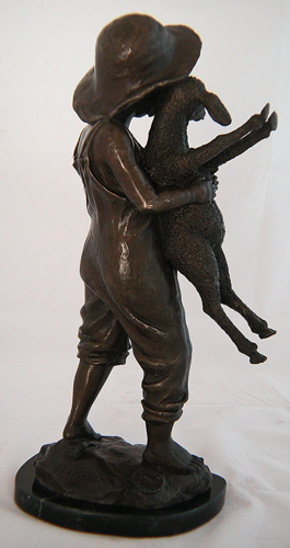 Farm boy statue rear and side view