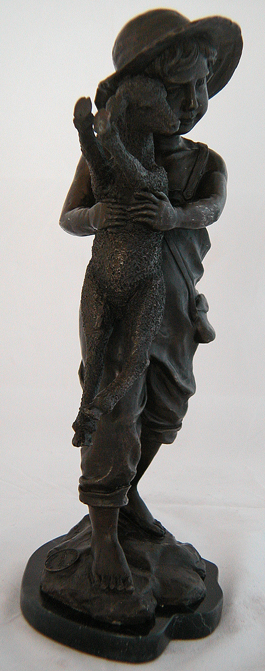 Farm boy statue side view