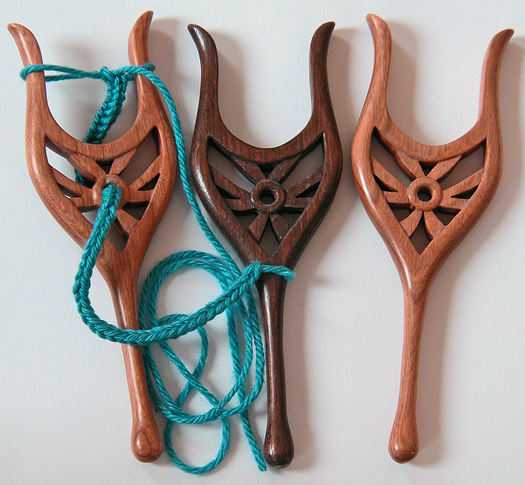 Three handcarved lucets