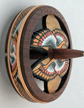 Birds of paradise walnut whorl Ringspindle side view