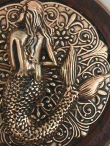 golden mermaid two inch walnut whorl close up view