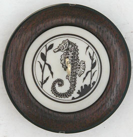 two inch seahorse walnut whorl ringspindle front view