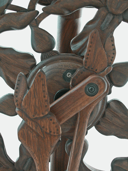 Walnut triple flyer butterfly and irises spinning wheel footman detail