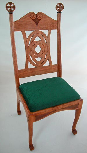 Celtic cross spinning chair green upholstery