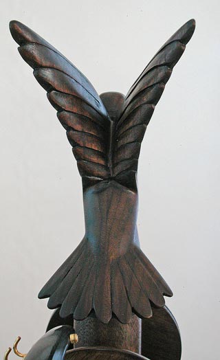 Taking flight spinning wheel figurehead rear triple flyer