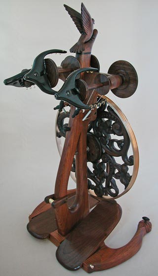 Taking flight spinning wheel operator view triple flyer