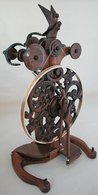Taking flight spinning wheel triple flyer